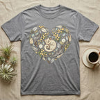 Grey t-shirt with a heart-shaped design of a sugar glider and leaves.