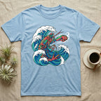 Light blue t-shirt with a stylized lobster in a crashing wave graphic.