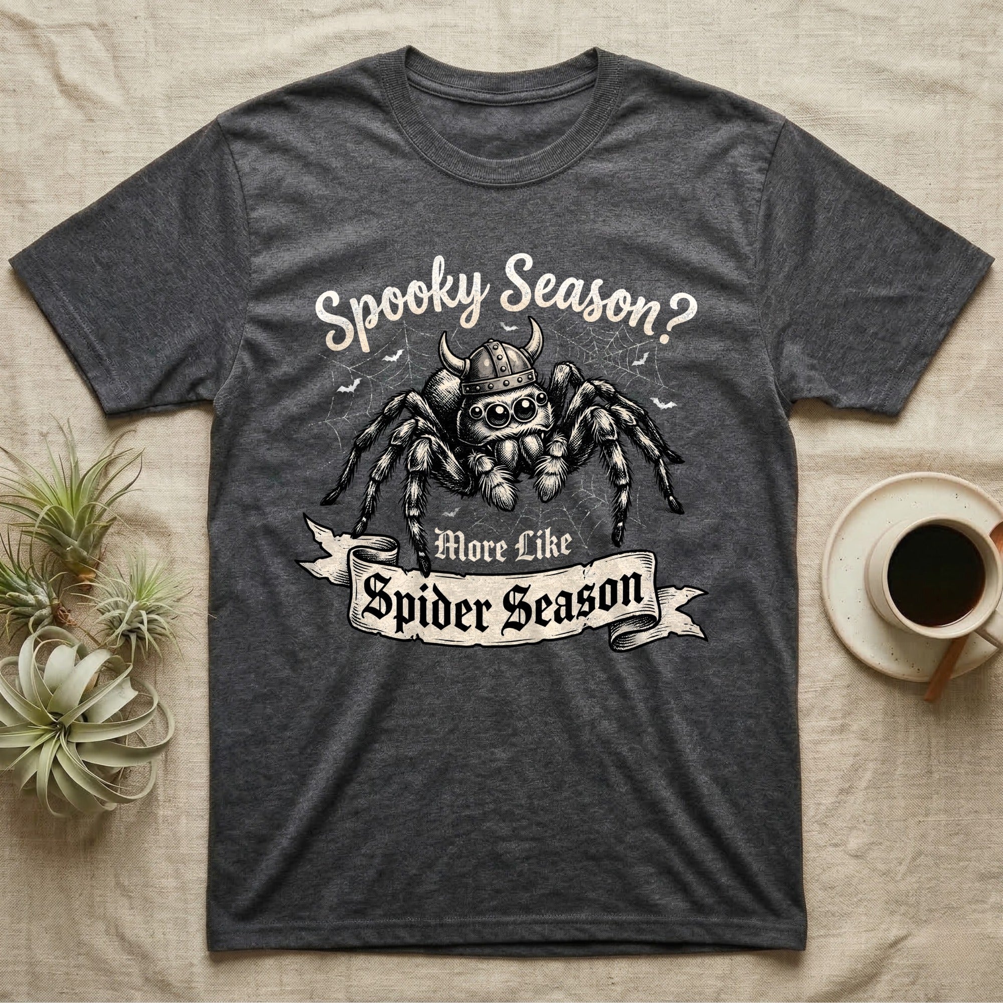 Jumping Spider Viking Helmet T-Shirt in Dark Heather — Ink-sketch jumping spider in a Viking helmet over a web, banner reading "More Like Spider Season."