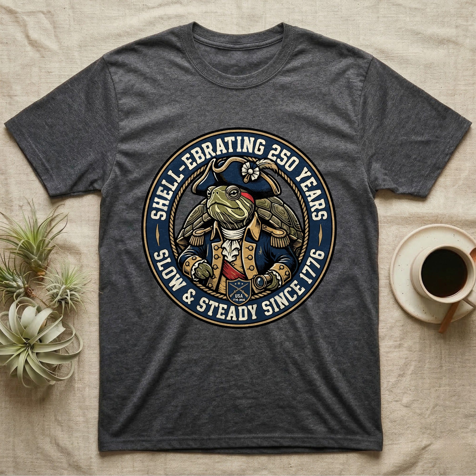 Sea Turtle General T-Shirt in Dark Heather — Circular crest of a sea turtle dressed as a Continental general with text Shell-Ebrating 250 Years.