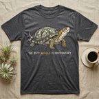 Box Turtle Wiggle T-Shirt in Dark Heather — Retro-illustration of a box turtle mid shell-scratch with a hand-drawn arrow at its wiggling rear and a deadpan marker caption.