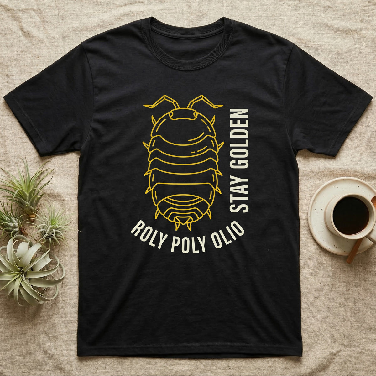 Roly Poly Isopod Stay Golden T-Shirt in Black — Golden outline drawing of a spined roly poly isopod beside vertical cream "Stay Golden" lettering.