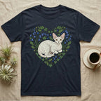 Dark t-shirt with white Cornish Rex cat in a heart-shaped floral design.