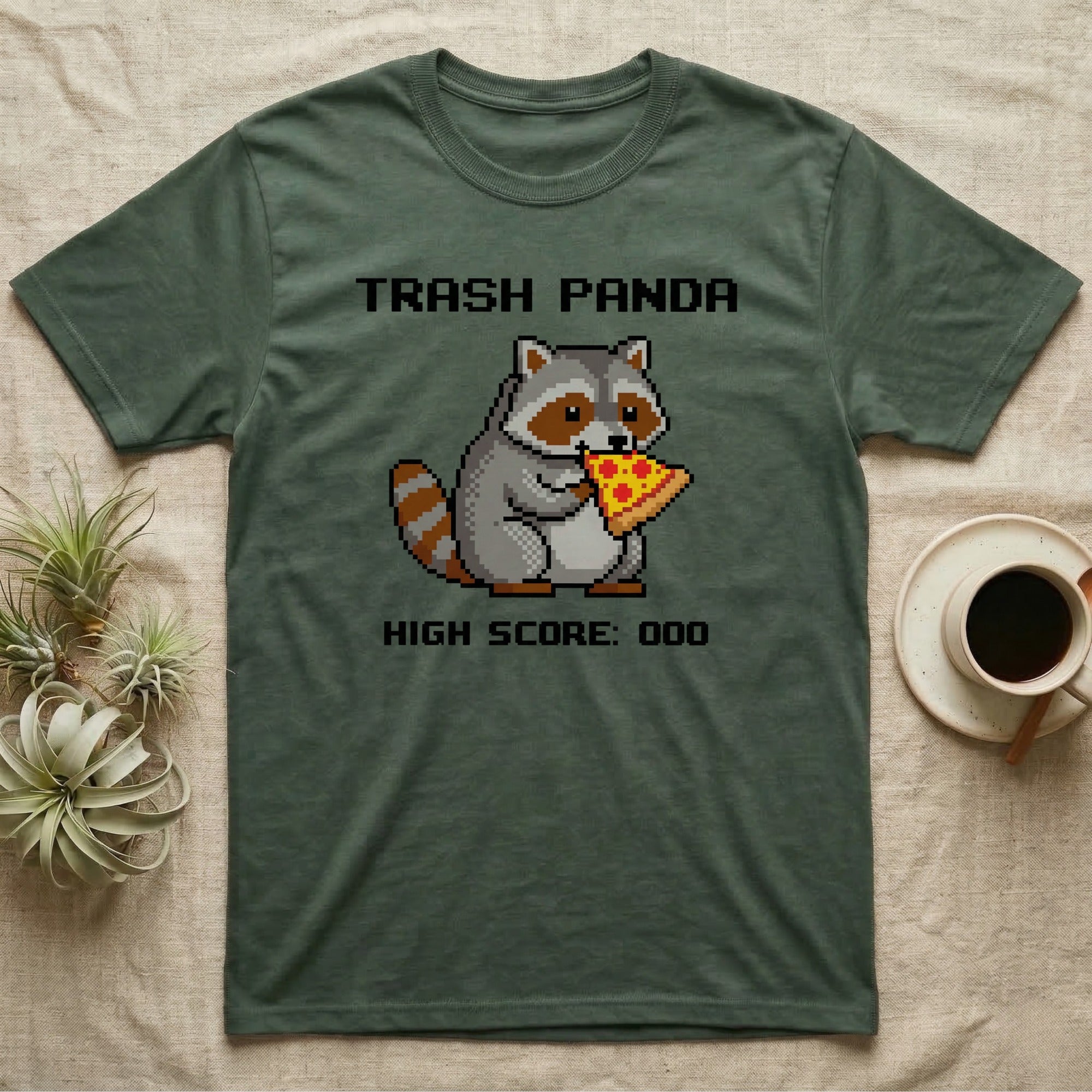 Pixelated raccoon wearing shirt with "Trash Panda High Score: 000" text, holding pizza.