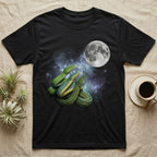 Green Tree Python Moon Howl T-Shirt in Black — Three Green Tree Python colour morphs howling at a full moon over a nebula on a dark grey t-shirt.