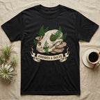 Black t-shirt featuring skull, mushrooms, ferns, and "Growth & Decay" banner.