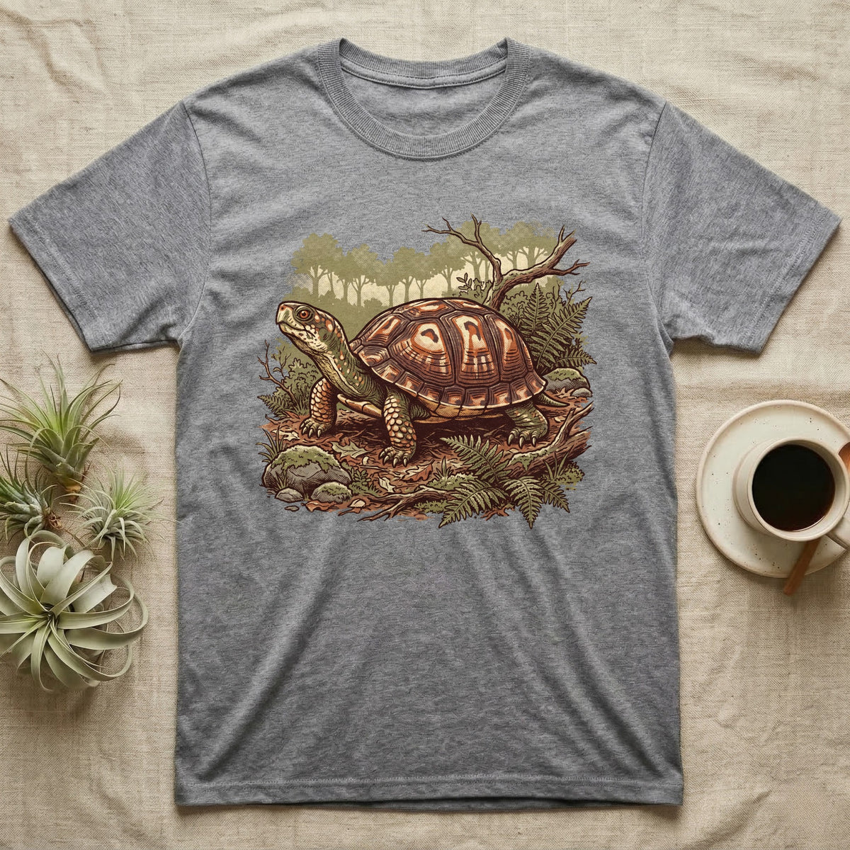 Wild Box Turtle T-Shirt in Sport Grey — Retro conservation-poster illustration of a box turtle in a woodland habitat slice with ferns and leaf litter.