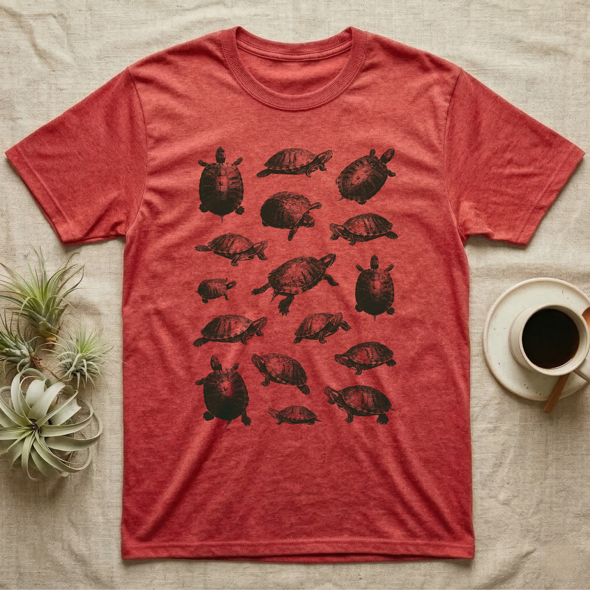 Red-Eared Slider Scatter T-Shirt in Heather Red — Seventeen red-eared sliders in one olive-green screen-print ink, scattered at varied scale, angle and size.