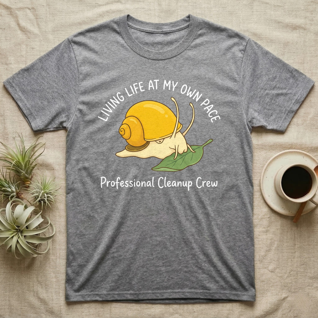 Grey t-shirt with a cartoon snail on a leaf and text: Living Life at My Own Pace, Professional Cleanup Crew.