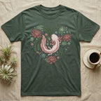 Green t-shirt with a pink axolotl surrounded by a heart of leaves and flowers.