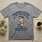 Bearded Dragon Freedom Nap T-Shirt in Sport Grey — Cartoon bearded dragon as a drummer boy under arched text Founding Father of the Freedom Nap, 250 Years of Chill.