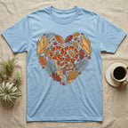 Light blue t-shirt with a heart-shaped snake and autumn leaves design.