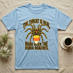 Tarantula Threat Dubia Roaches T-Shirt in Light Blue — Metal-style tarantula in threat posture with a candy-corn abdomen, "The Threat Is Real, Hand Over the Dubia Roaches."