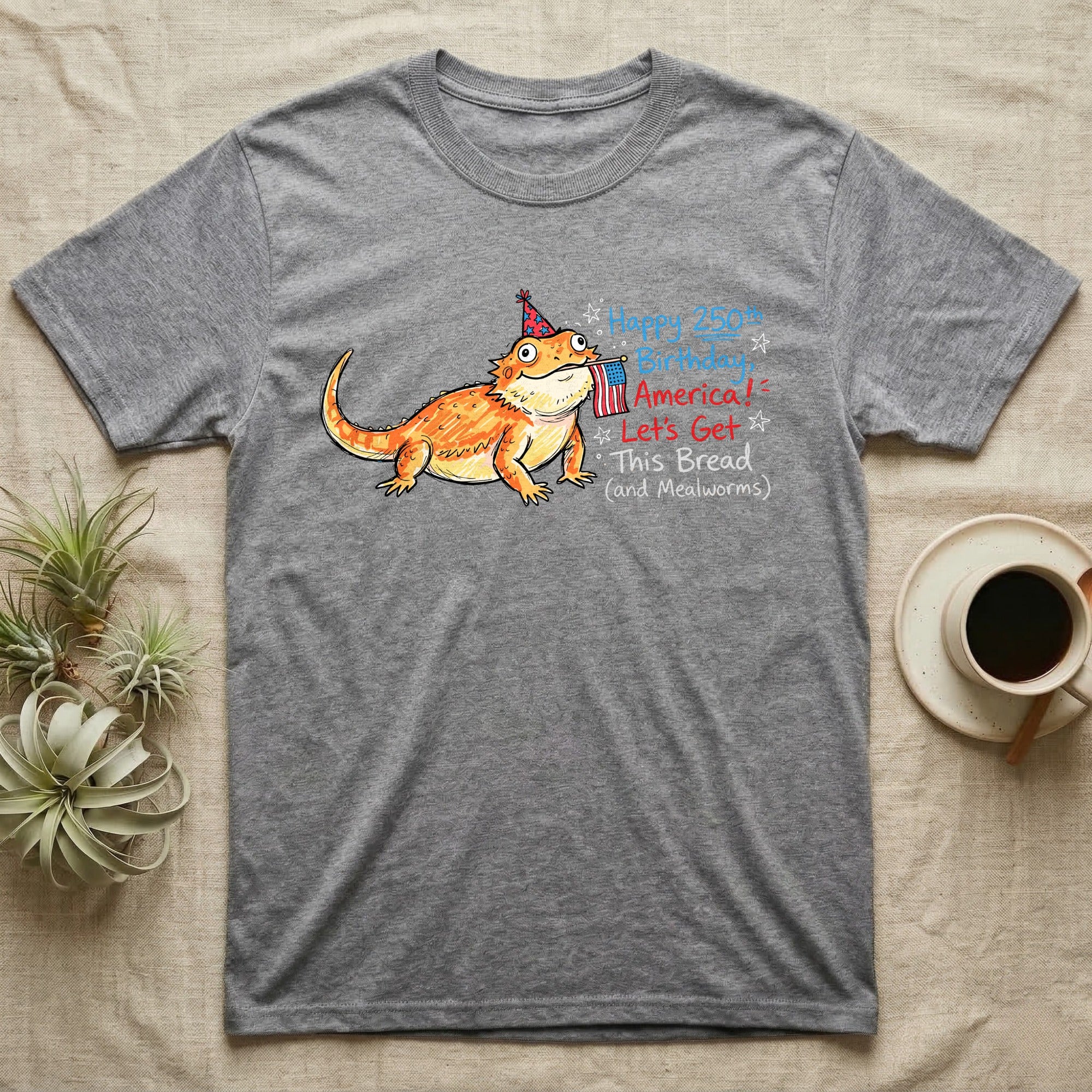 Bearded Dragon Birthday T-Shirt in Sport Grey — Sketch-style bearded dragon in a party hat holding a flag with handwritten text Happy 250th Birthday, America.