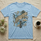 Light blue t-shirt with leaping spotted cat and Japanese-inspired clouds.