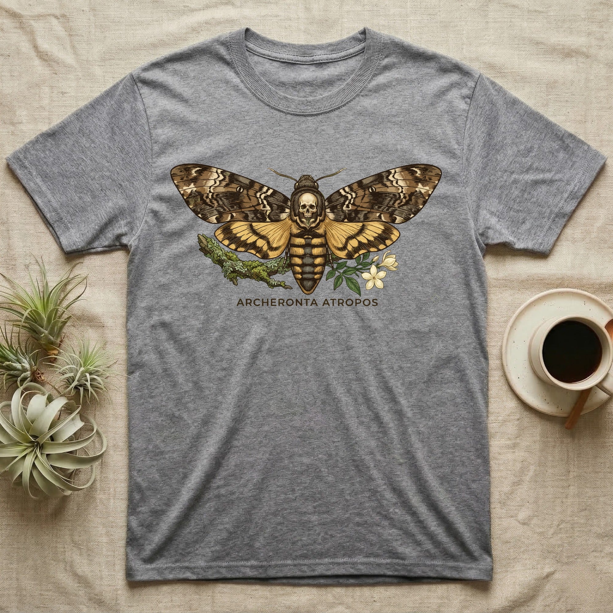 Grey t-shirt with large moth and skull graphic, text "ARCHERONTIA ATROPOS".
