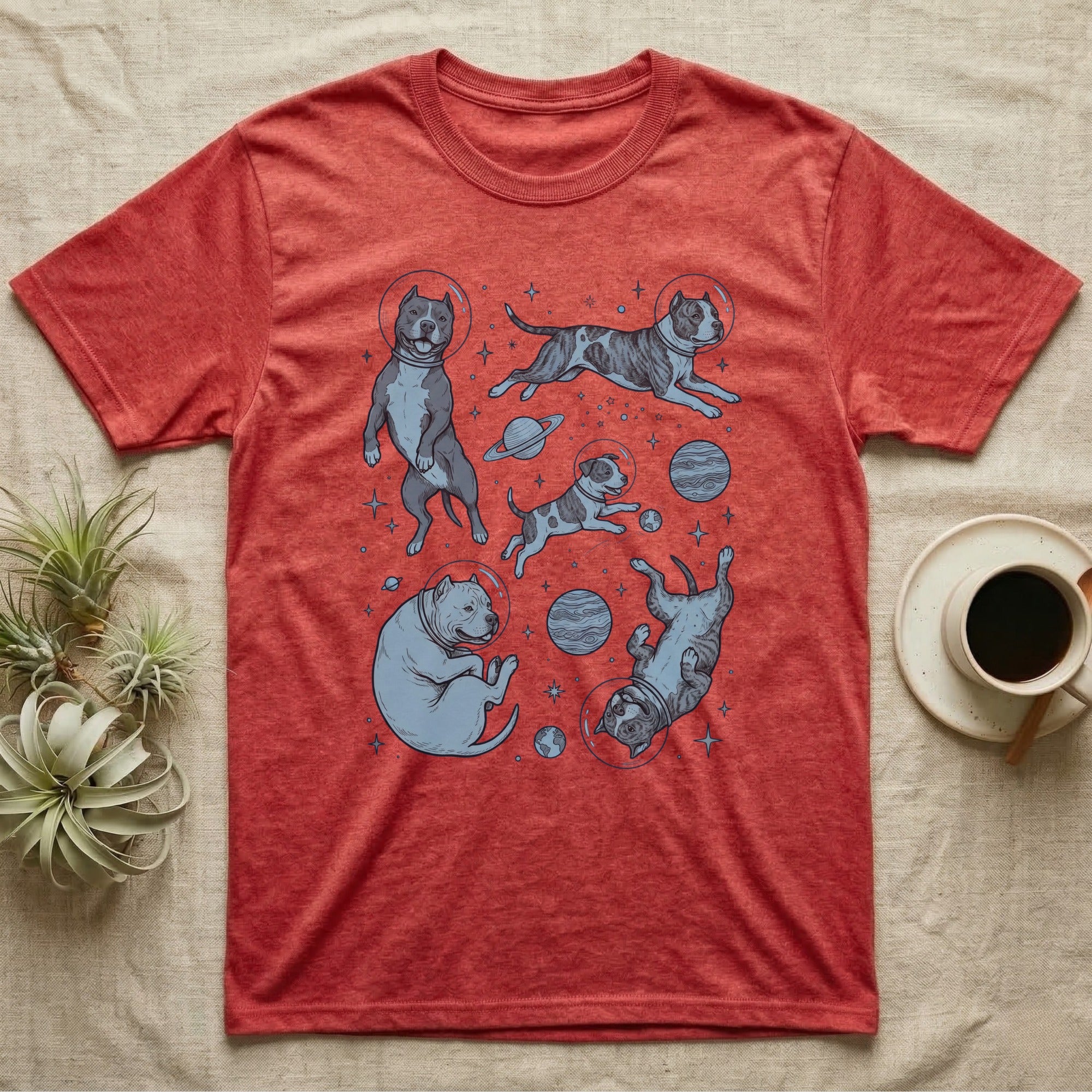 Red t-shirt with cartoon pit bulls in space and planets.