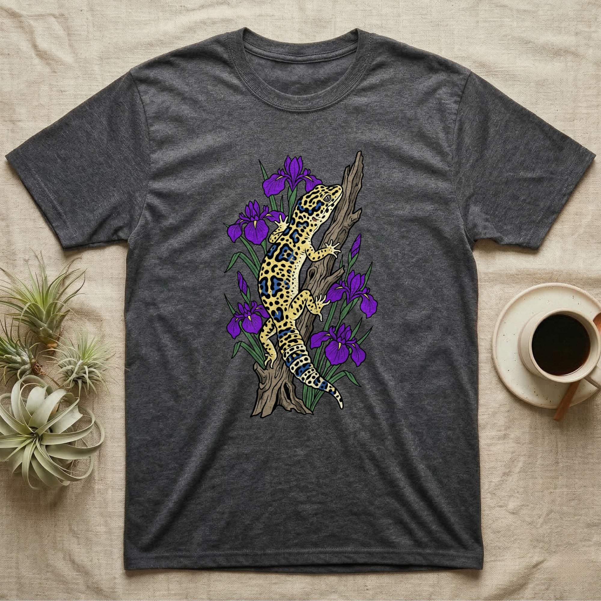 Dark gray t-shirt with leopard gecko and purple flowers graphic.