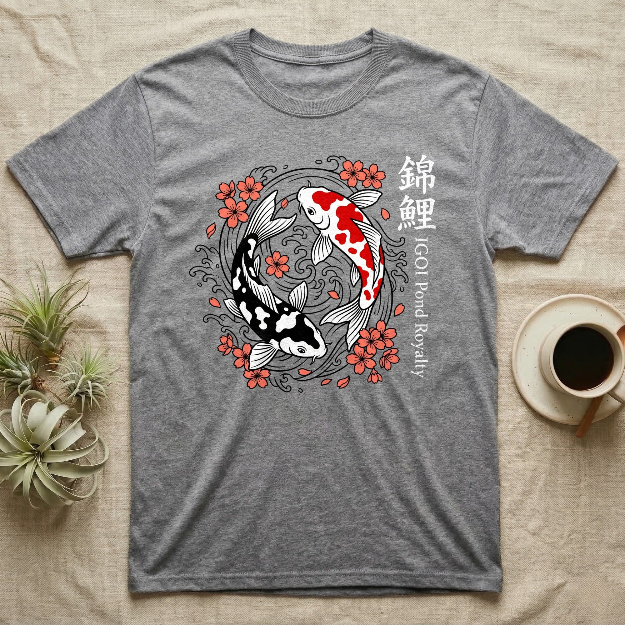 Gray t-shirt with yin-yang koi fish and cherry blossoms.