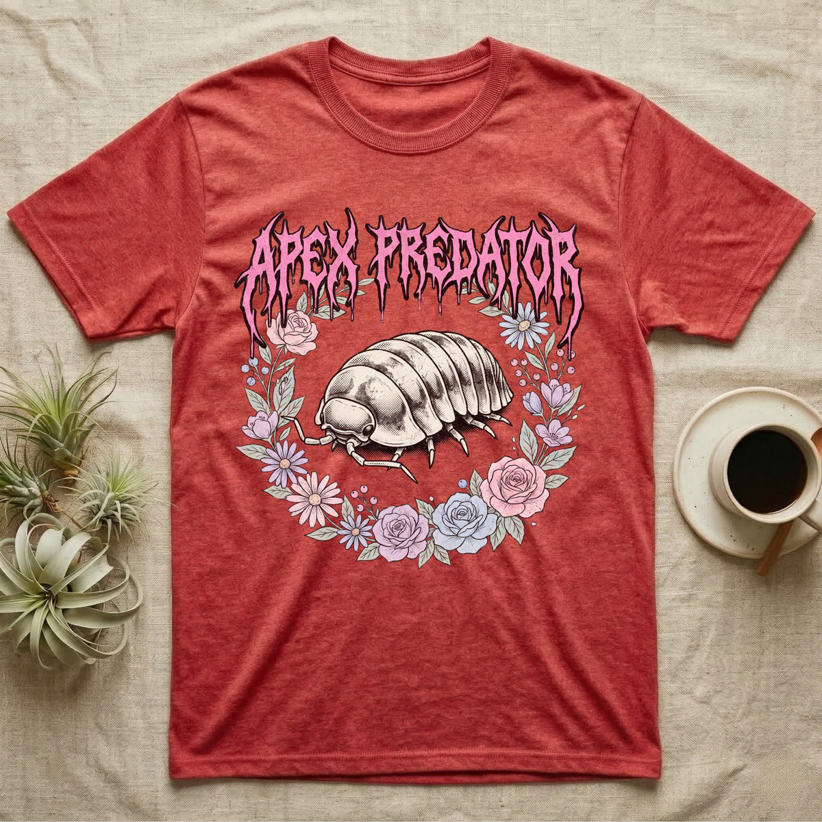 Apex Predator Isopod T-Shirt in Heather Red — Bootleg design of a cute isopod in a floral wreath under dripping death-metal lettering reading "Apex Predator."
