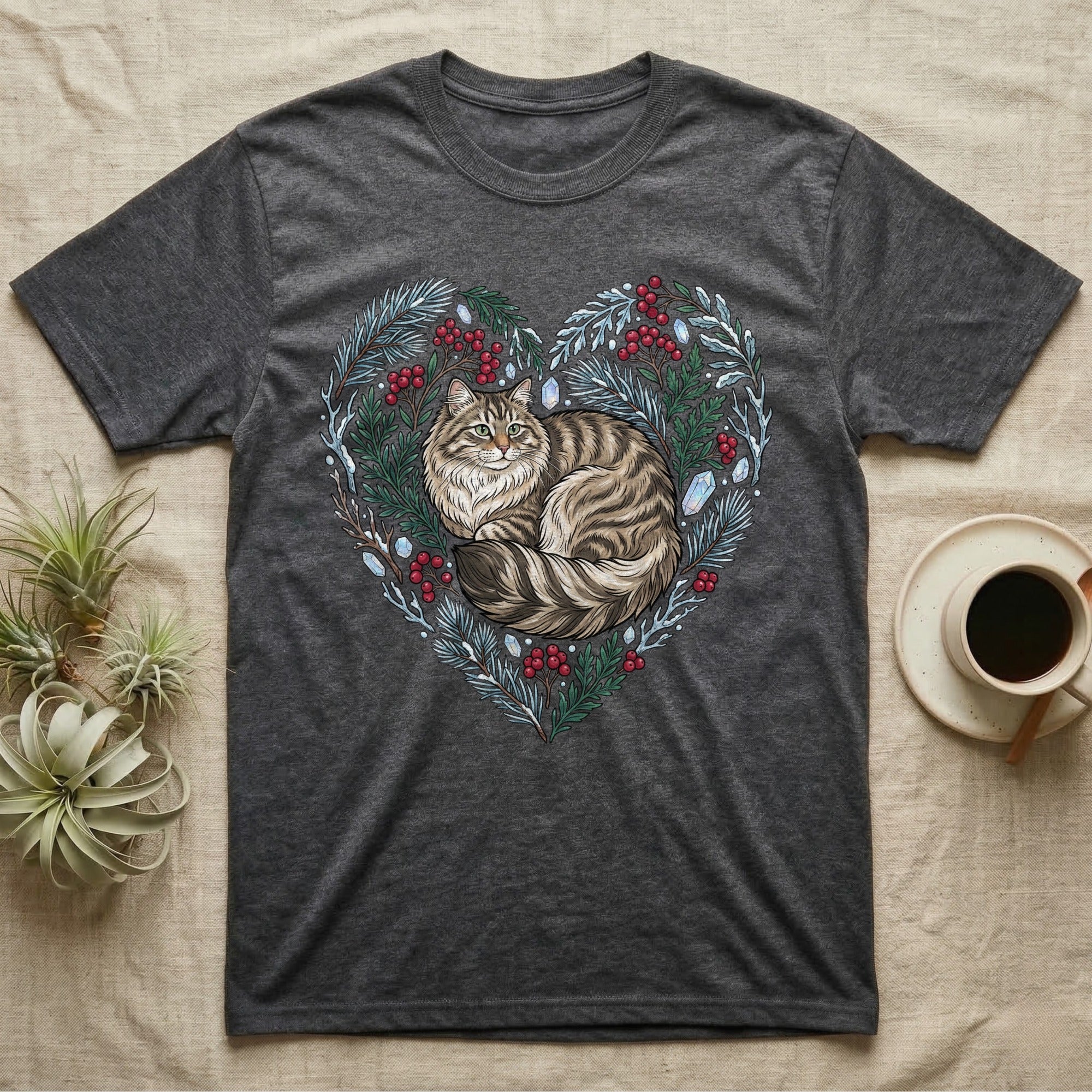 Gray t-shirt with a tabby cat curled inside a heart-shaped wreath of berries and ice.