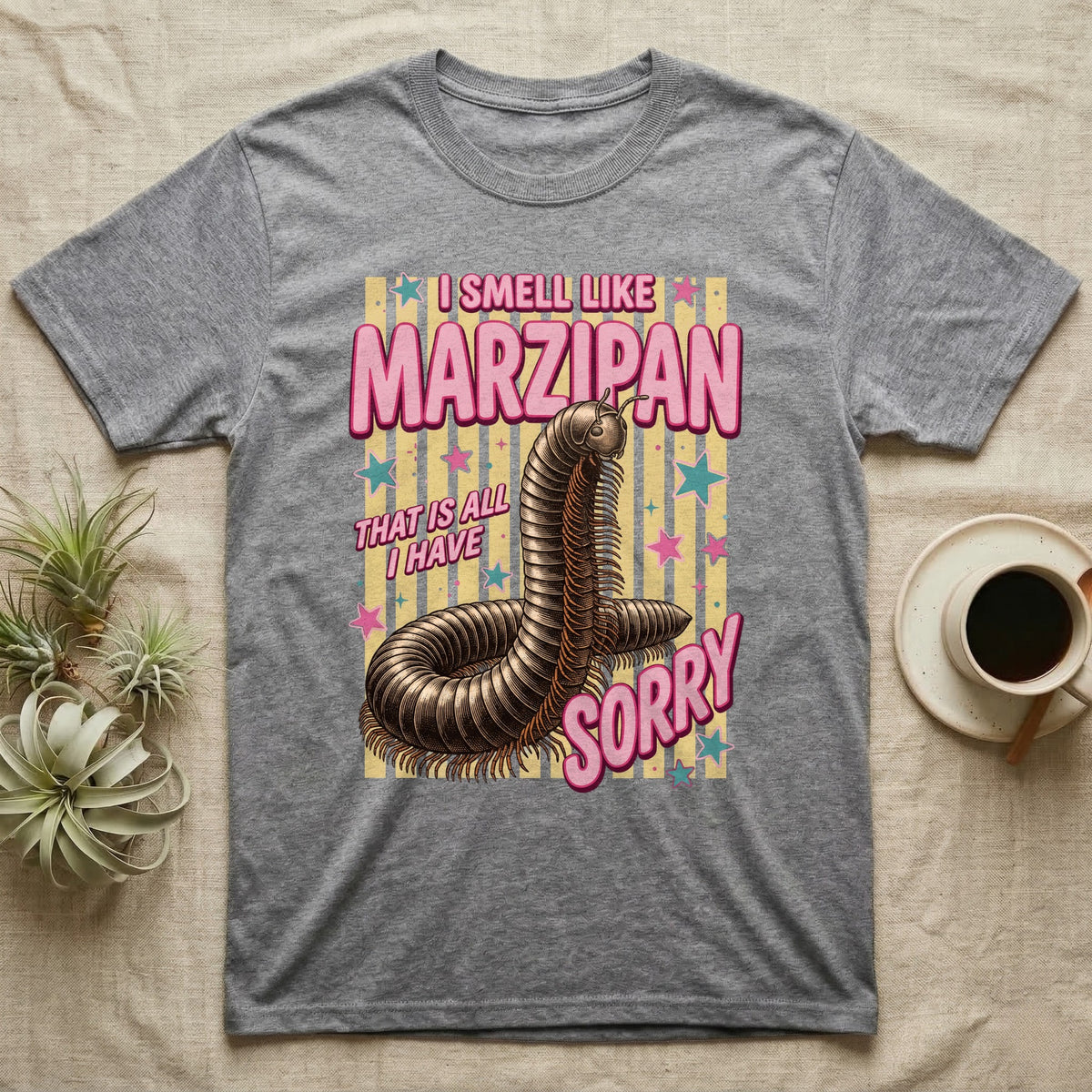 Millipede Almond Defence T-Shirt in Sport Grey — Engraved giant African millipede coiled upright under fat pink club lettering reading ALMOND DEFENCE on yellow stripes.