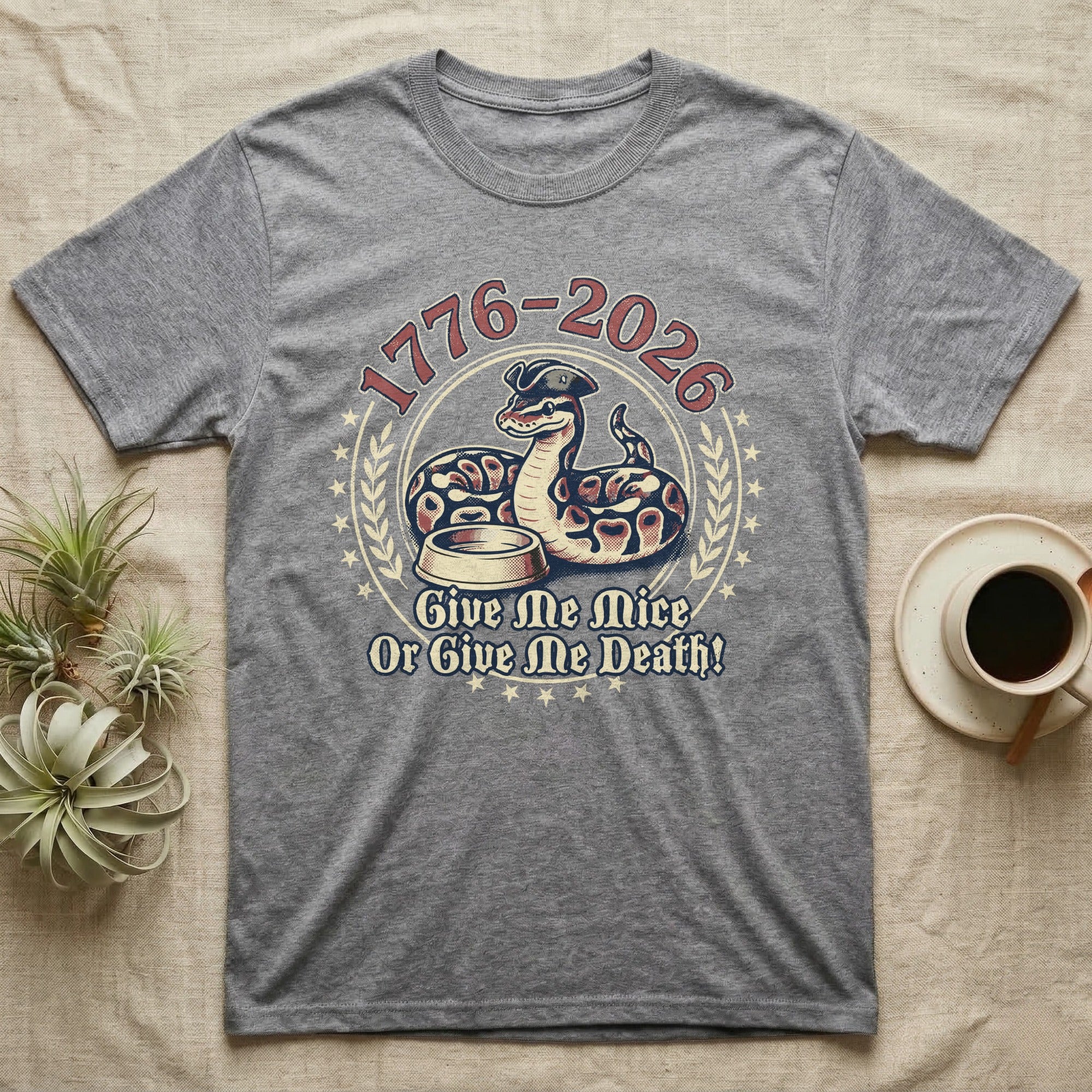 Ball Python 1776 T-Shirt in Sport Grey — Vintage distressed badge of a ball python in a feeding strike over a food dish, cream and brick-red emblem reading Give Me Mice Or Give Me Death.