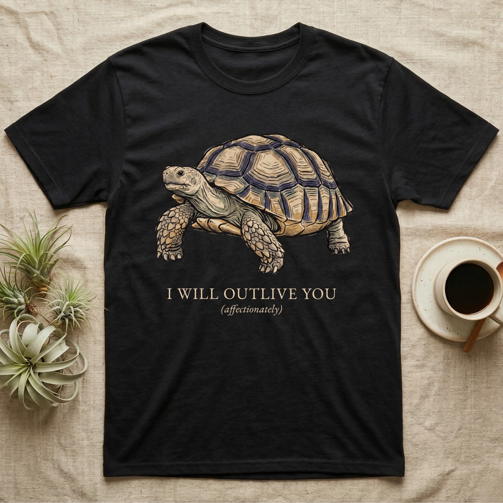 Sulcata Outlive You T-Shirt in Black — Ukiyo-e woodblock illustration of a sulcata tortoise in profile with a deadpan serif caption about outliving you.