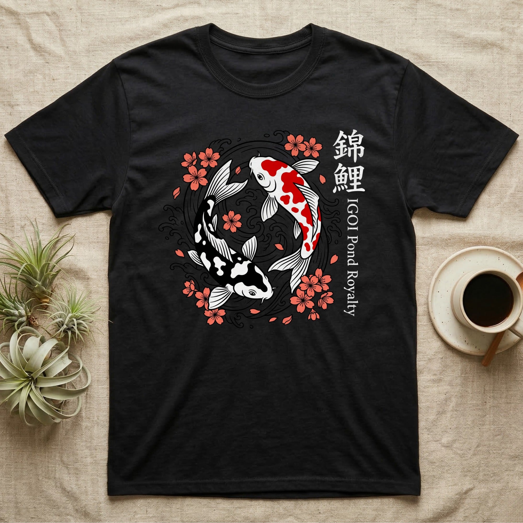 Black t-shirt with yin-yang koi fish and cherry blossoms design.