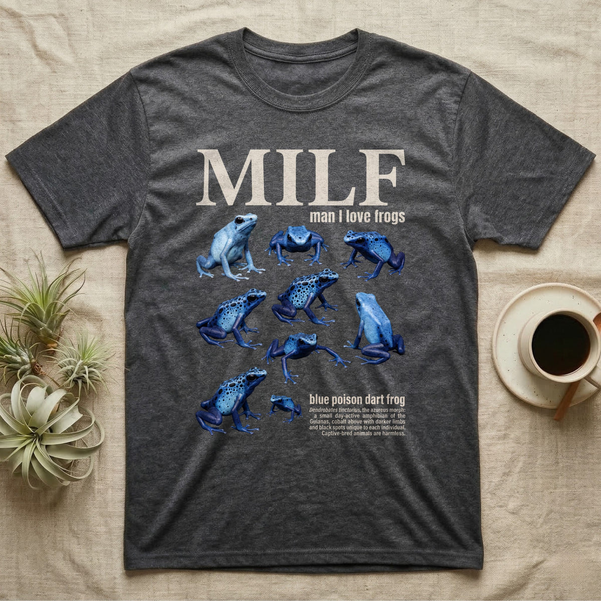 Blue Poison Dart Frog T-Shirt in Dark Heather — Eight blue poison dart frogs in a cut-out photo collage beneath the huge cream word MILF on grey.