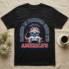 Bearded Dragon Basking T-Shirt in Black — Sports-logo bearded dragon in a tricorn hat under a collegiate arch reading Basking in Freedom Since 1776.