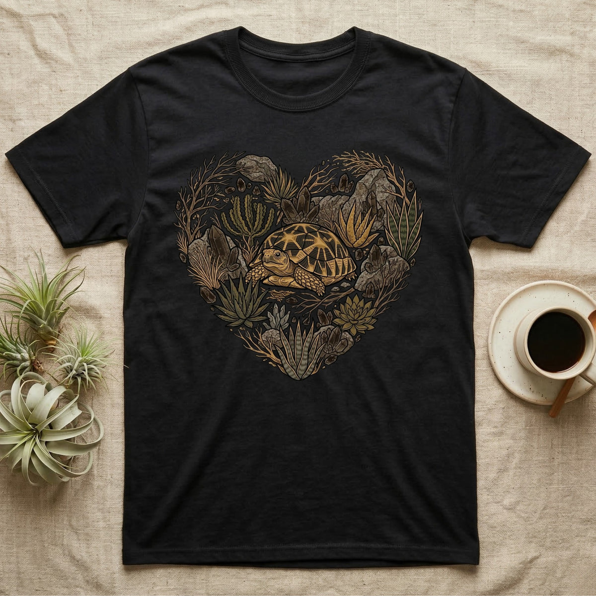Black t-shirt with a heart-shaped nature design featuring a turtle.