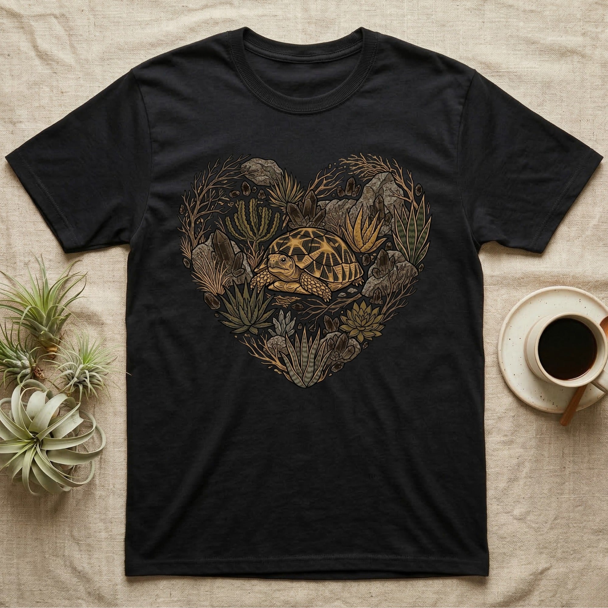 Black t-shirt with a heart-shaped nature design featuring a turtle.
