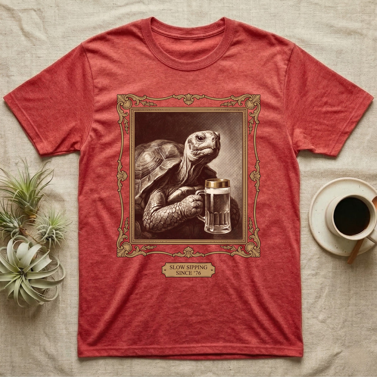 Slow Sipping Tortoise T-Shirt in Heather Red — Old-master oil portrait of a dignified tortoise holding a beer stein with a brass "Slow Sipping Since '76" plaque.