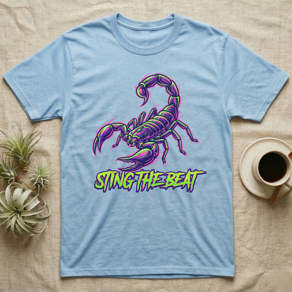 Light blue t-shirt with neon purple and green scorpion graphic and text.