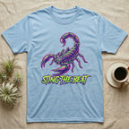 Light blue t-shirt with neon purple and green scorpion graphic and text.