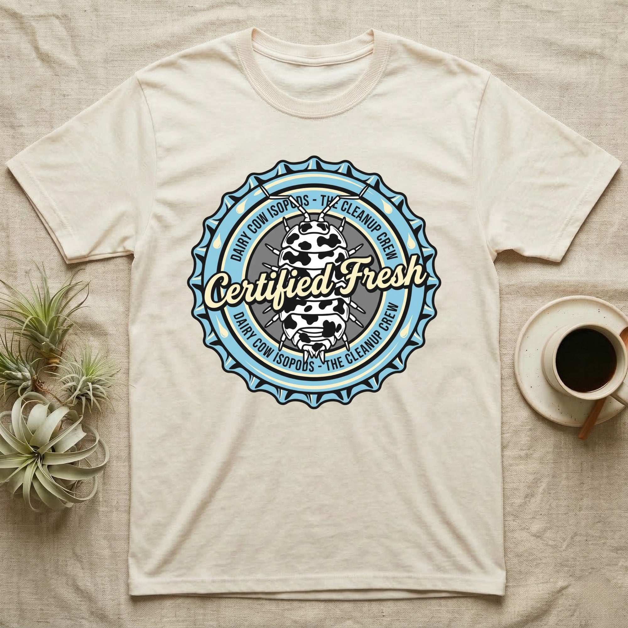 Cream t-shirt with "Certified Fresh" Dairy Cow Isopods cleanup crew logo.