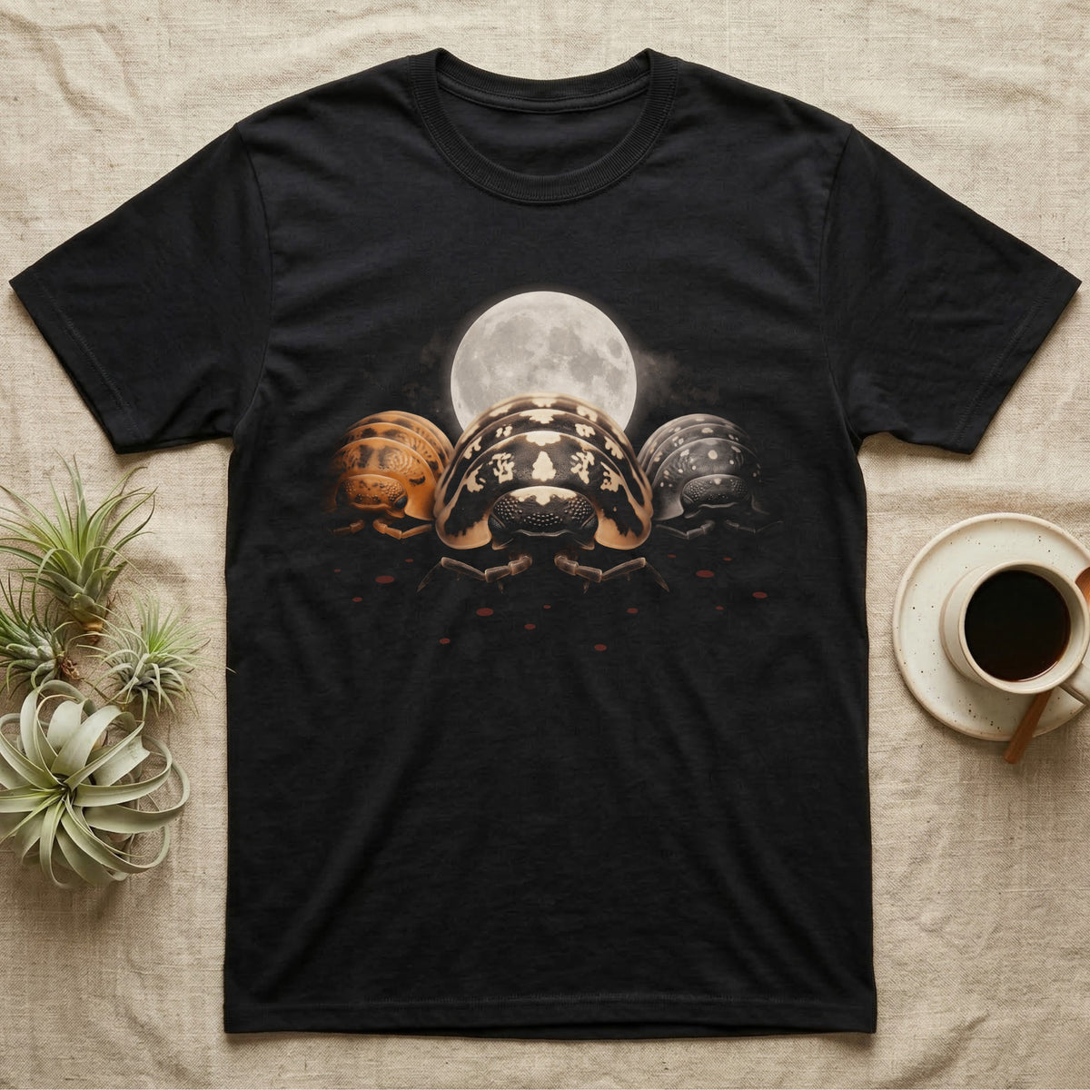 Isopod Moon Trio T-Shirt in Black — Three isopod morphs in a shallow arc before a full moon, lit warm and low, fading into black.
