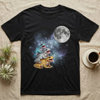 White's Tree Frog Moon Howl T-Shirt in Black — Three White's Tree Frog colour morphs howling at a full moon over a nebula on a dark grey t-shirt.