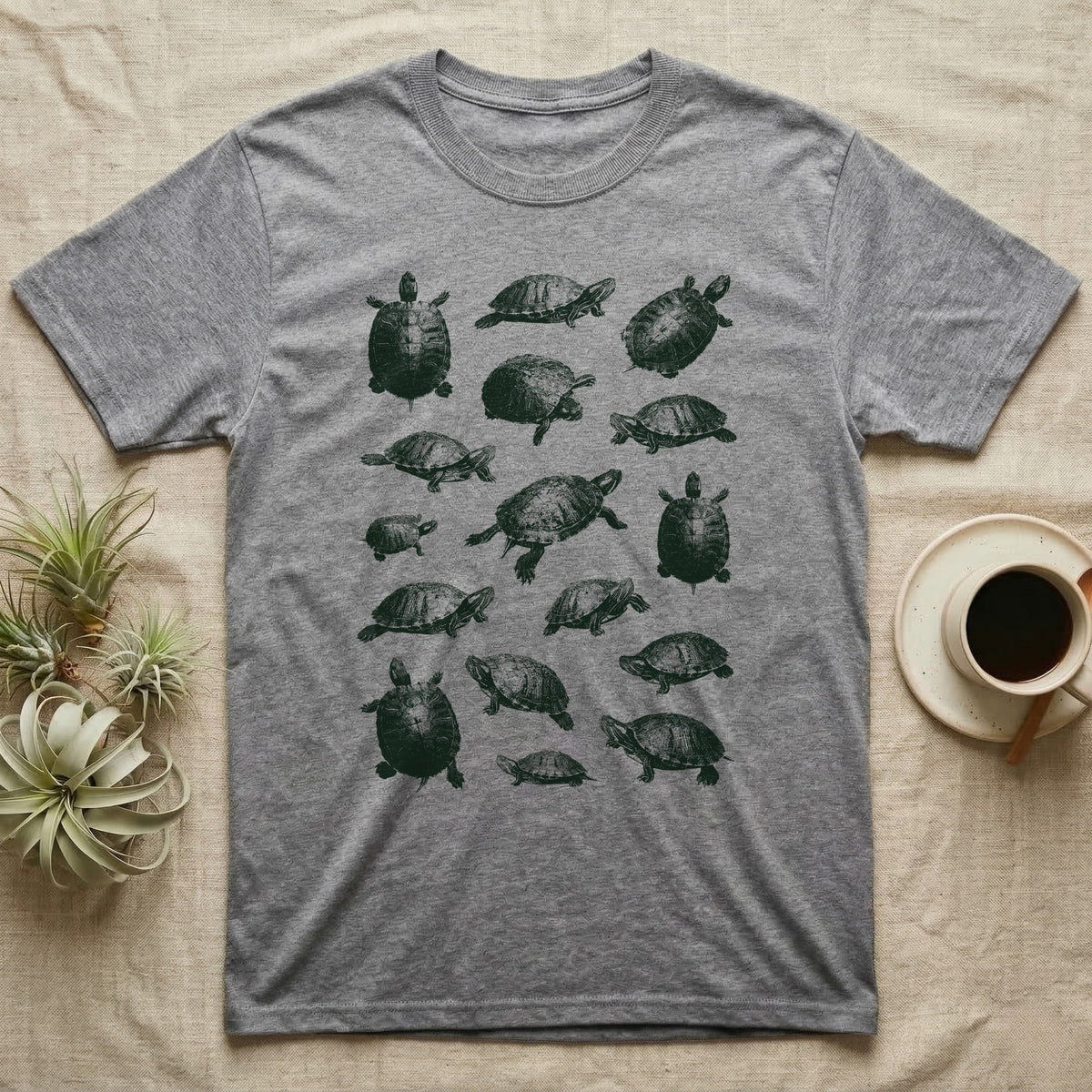 Red-Eared Slider Scatter T-Shirt in Sport Grey — Seventeen red-eared sliders in one olive-green screen-print ink, scattered at varied scale, angle and size.