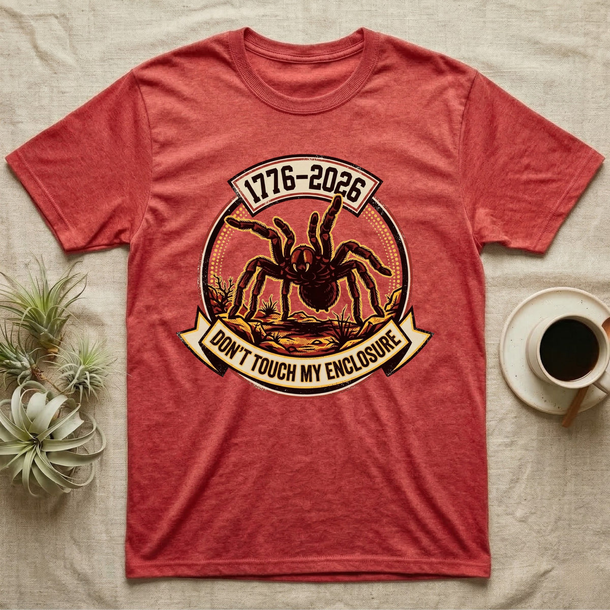Tarantula Don't Touch Enclosure Tee in Heather Red — Distressed circular badge of a defensive tarantula on desert ground, red and gold banner reading Don't Touch My Enclosure, on black.