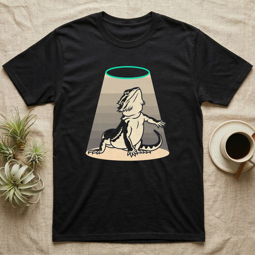 Bearded Dragon Diva T-Shirt in Black — Bold vector illustration of a bearded dragon in a dramatic stage pose under a soft spotlight, chin lifted.