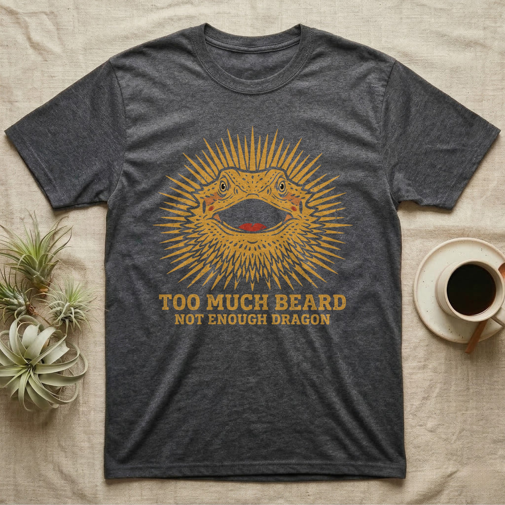 Bearded Dragon Not A Costume T-Shirt in Dark Heather — Block-print bearded dragon mid-wave in one terracotta ink, ringed by the words NOT A COSTUME and this beard is mine.