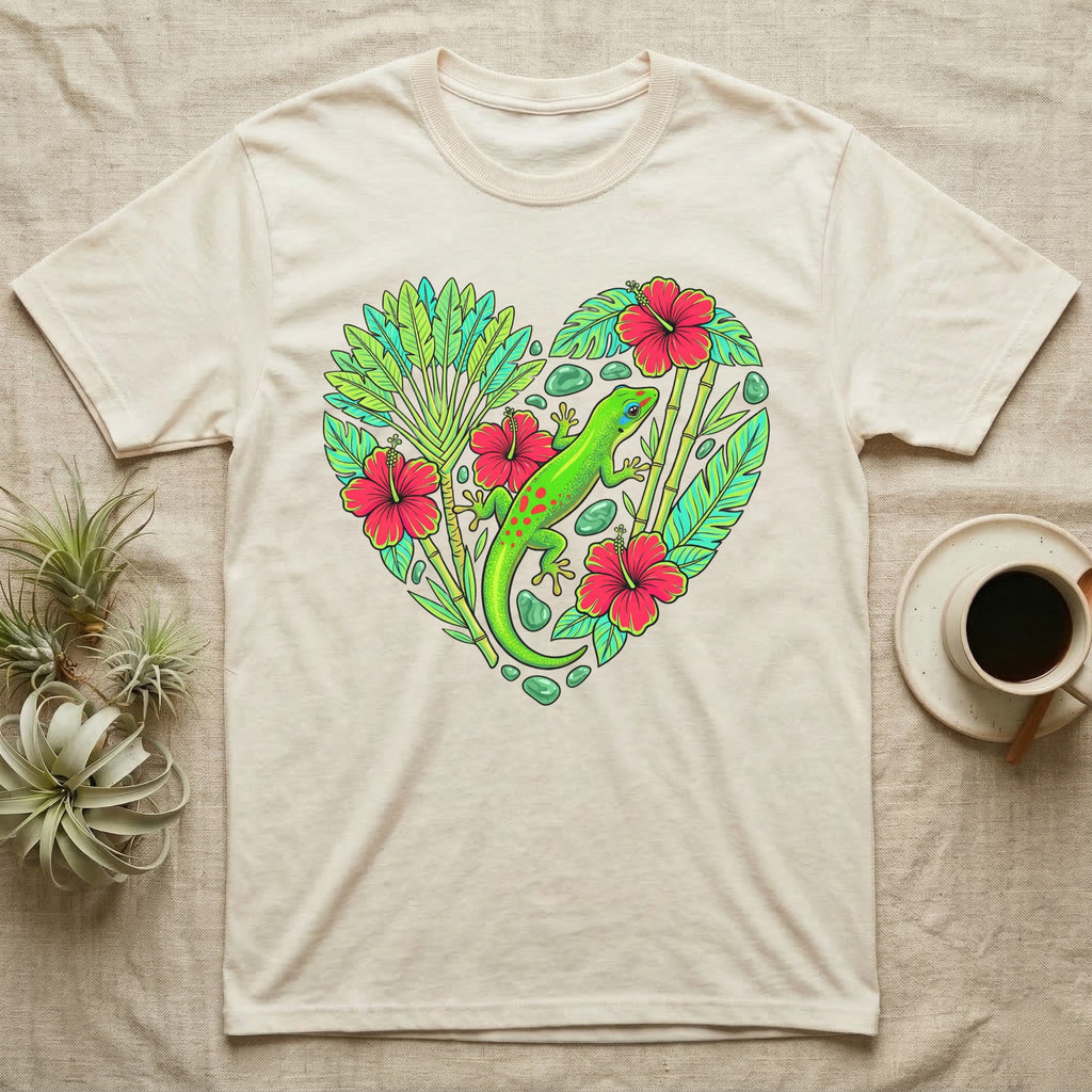 Cream t-shirt with heart-shaped tropical design featuring a gecko and hibiscus flowers.