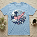 Light blue t-shirt with pink axolotl in a wave design.