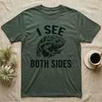 Panther Chameleon Mediator T-Shirt in Military Green — Etching of a panther chameleon holding a twig, its eyes pointing opposite ways, under I SEE, above BOTH SIDES
