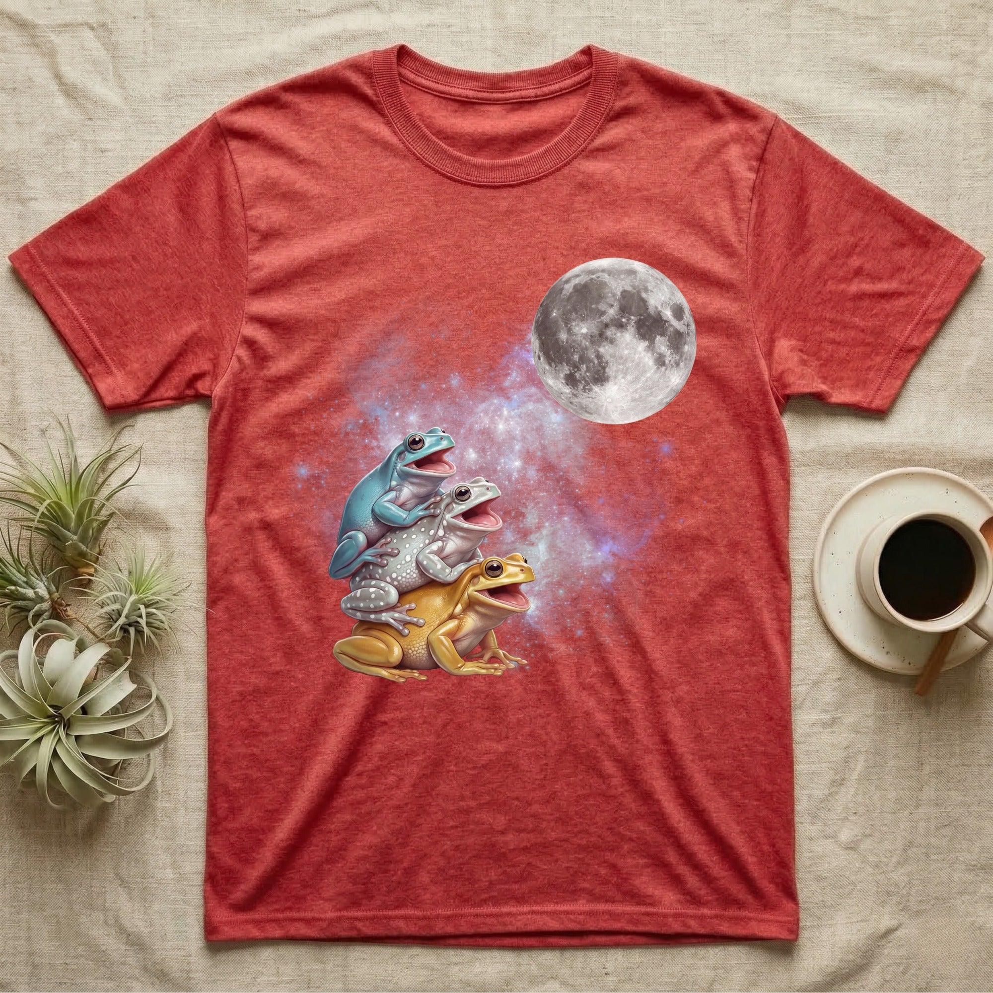 White's Tree Frog Moon Howl T-Shirt in Heather Red — Three White's Tree Frog colour morphs howling at a full moon over a nebula on a dark grey t-shirt.
