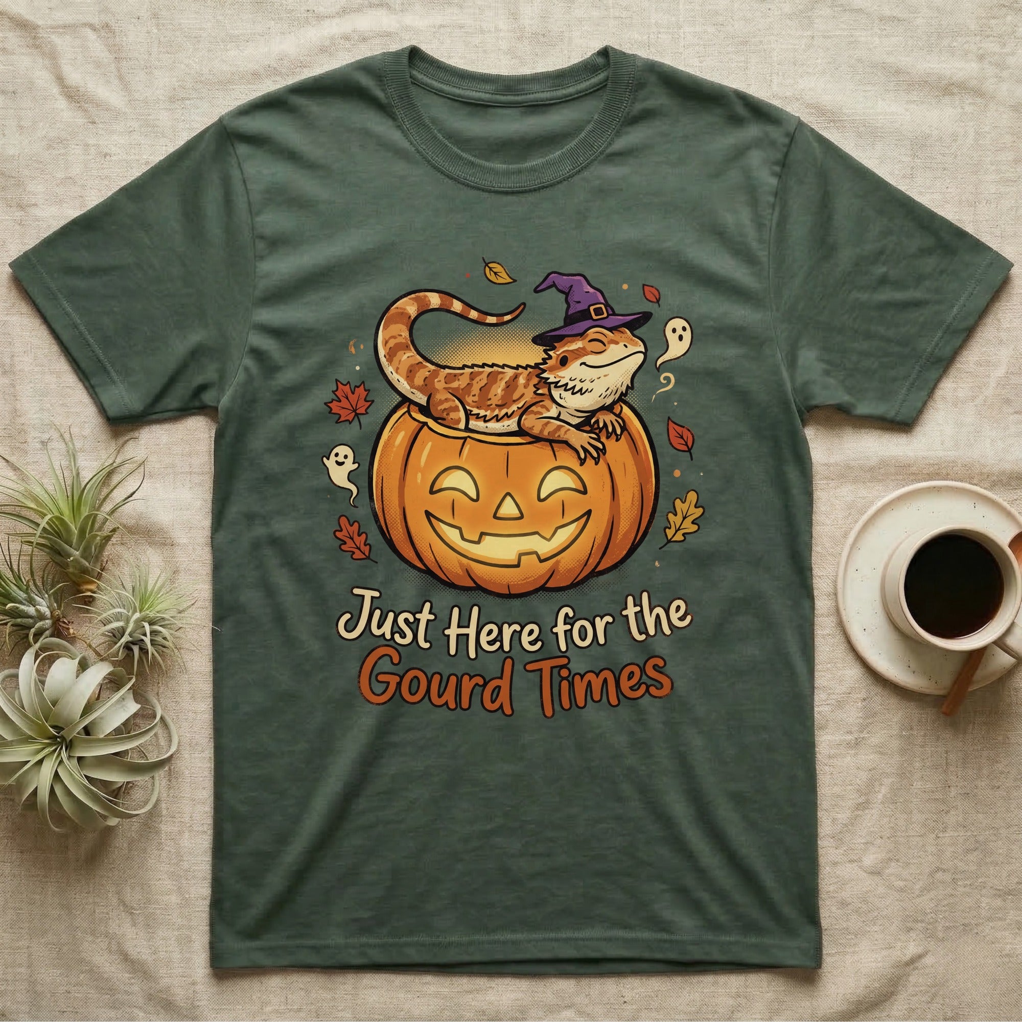 Bearded Dragon Gourd Times T-Shirt in Military Green — Cartoon bearded dragon in a witch hat lounging in a jack-o'-lantern, "Just Here for the Gourd Times."