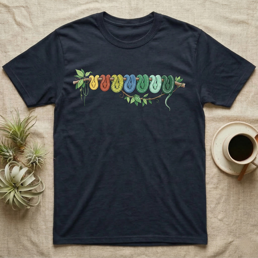 Green Tree Python Canopy Crew T-Shirt in Navy — Watercolor illustration of a green tree python in seven real colour-change stages coiled on a branch, dark grey T-shirt design.