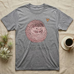 Hedgehog Do Not Unball Tee in Sport Grey — Naive-doodle hand-drawn hedgehog curled in a tight defensive ball above a wobble-handwritten "Do Not Unball" label.